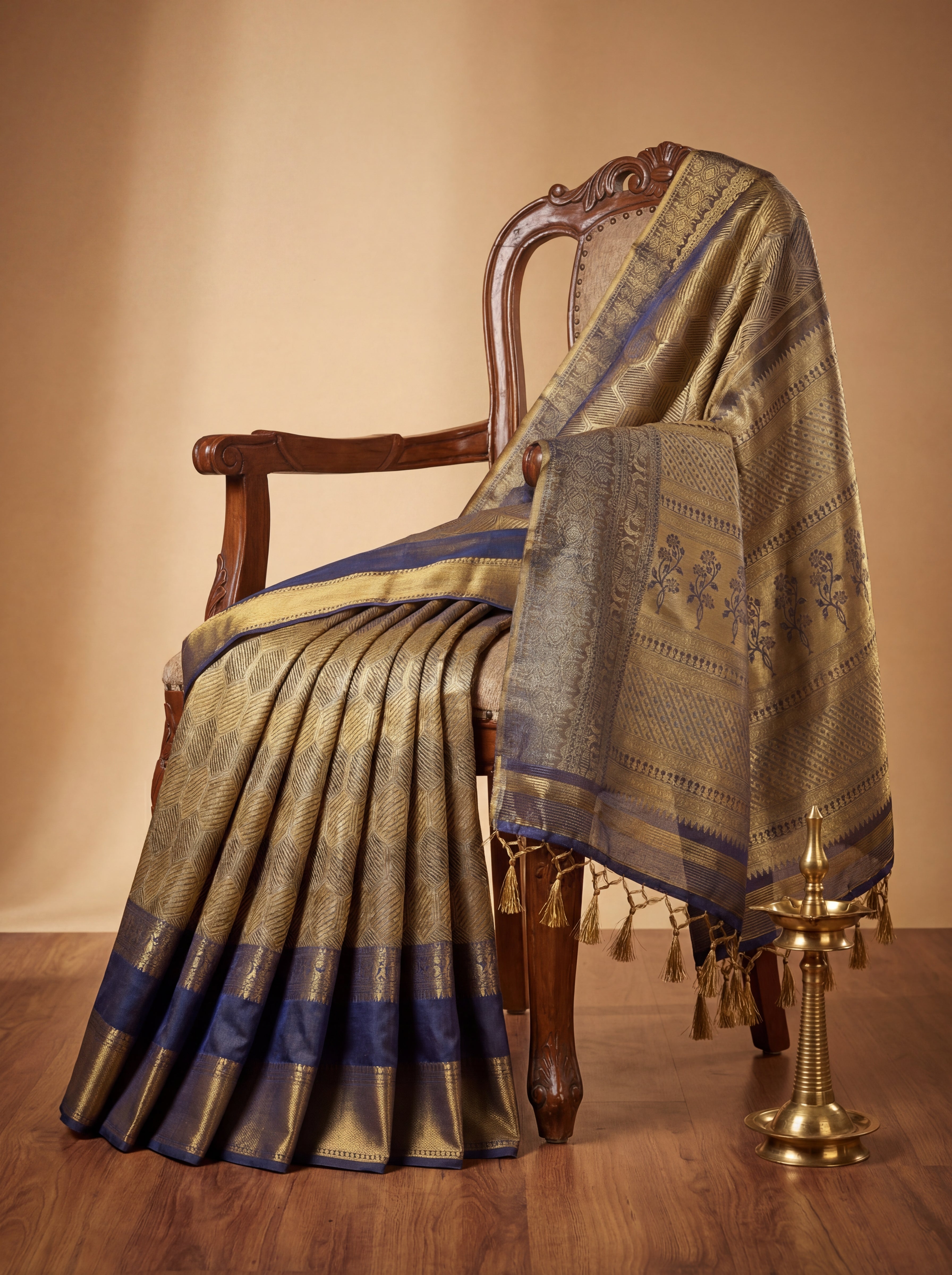 Antique Gold Tissue Silk Saree with Geometric Honeycomb Weave & Floral Zari Panel – Contrast Grey Pallu