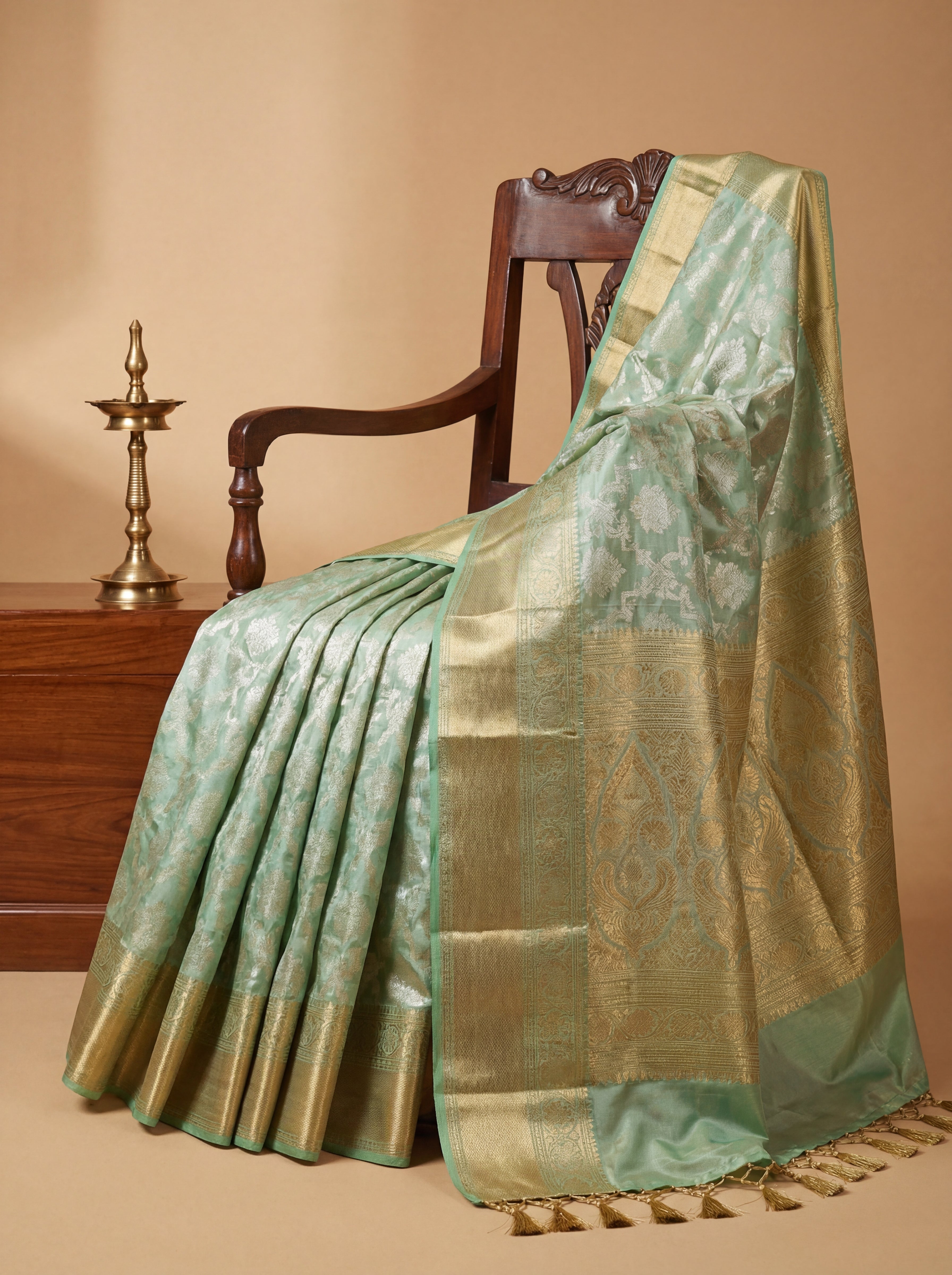 Pastel Pistachio Green Tissue Silk Saree with Floral Self-Weave & Contrast Mint Border – Elegant Festive Drape